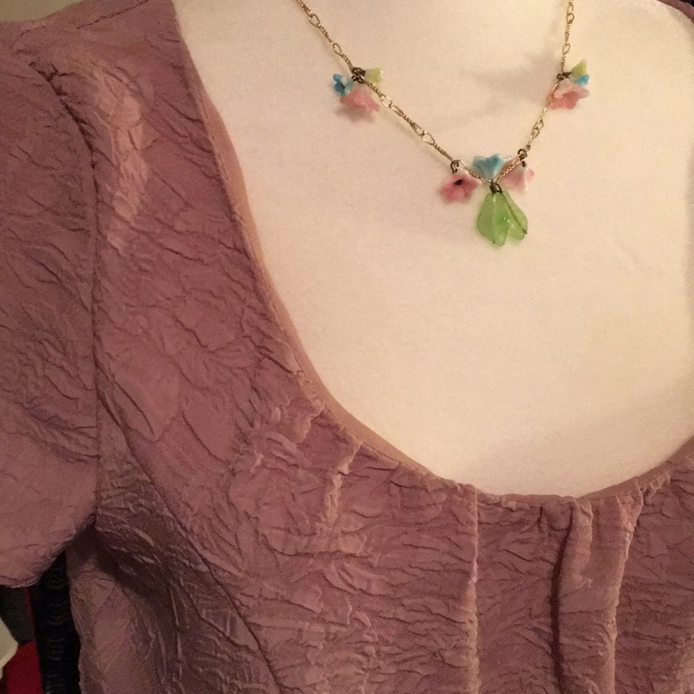 Mauve dress.